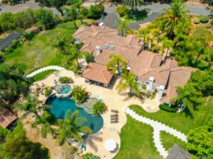 aerial photo of aton center home with pool and garden
