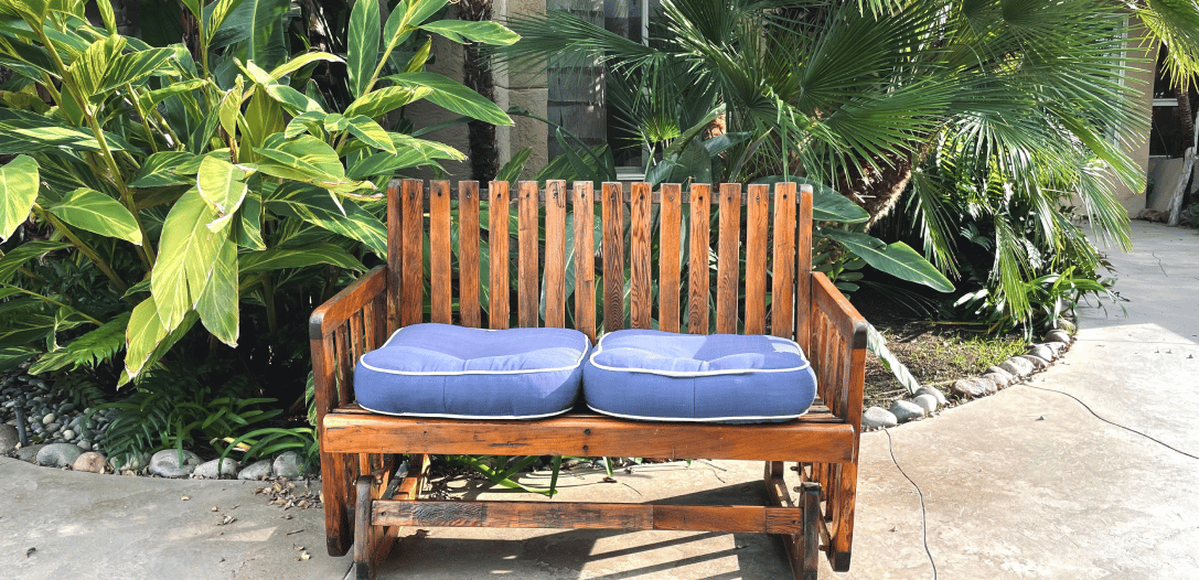 a bench in a garden