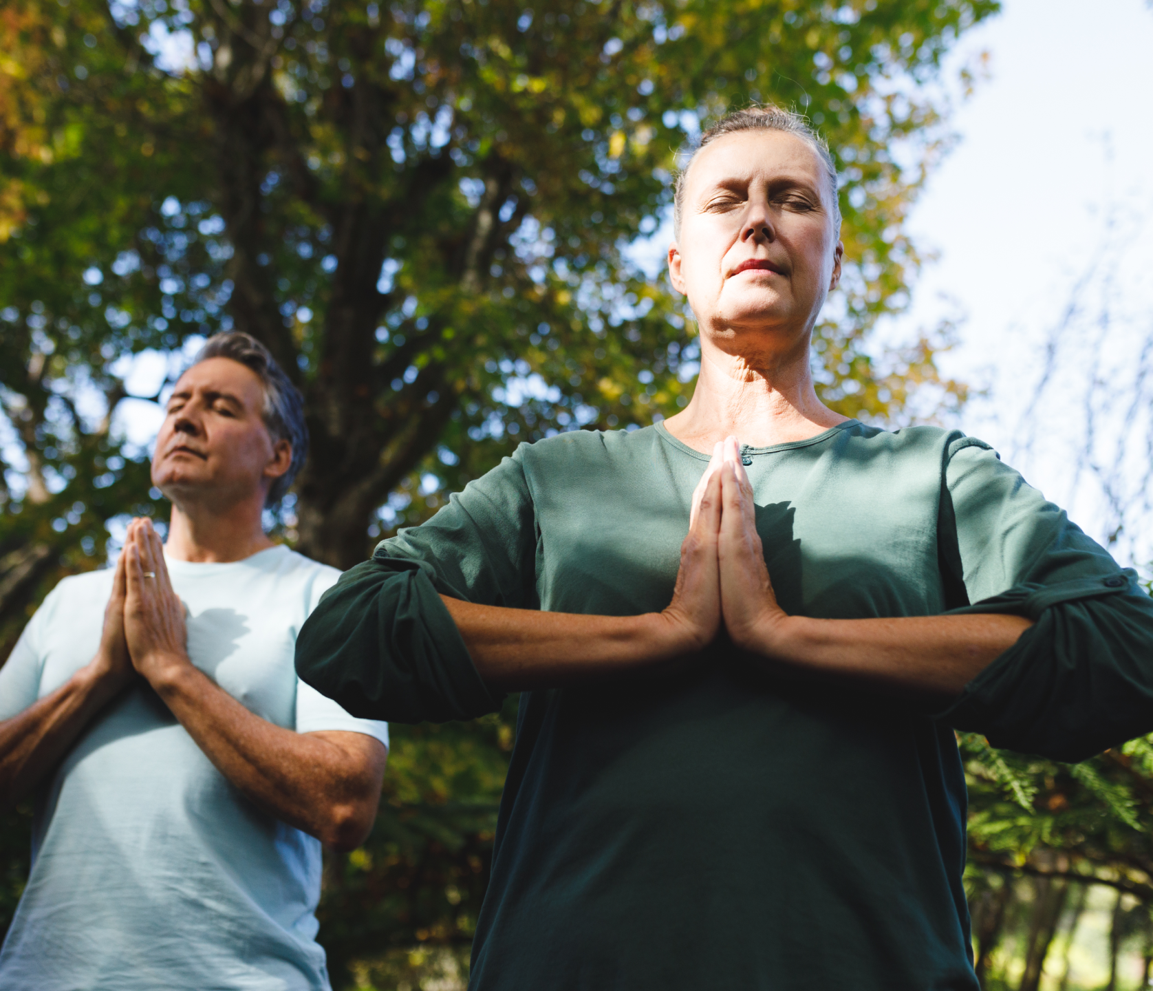 Senior couple trying to enhance their mind body connection together